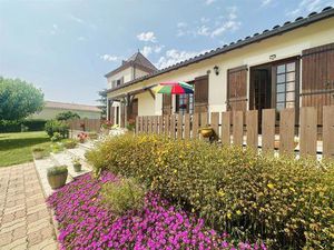 Maison de 4 chambres avec un garage double et un potentiel de développement...