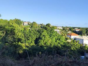 Vente de terrain + maison