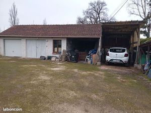 Terrain à bâtir avec 2 garages