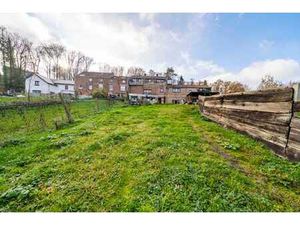 Immeuble mixte avec un terrain constructible