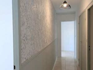 T4 avec balcon  tram et commerces à proximité