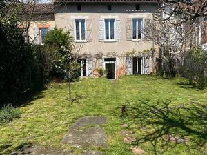 Grande maison de ville avec jardin