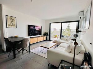 Appartement T2 de standing RDC avec terrasse et jardin plein sud au carré d’or parking pri