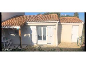 Maison avec garage et jardin