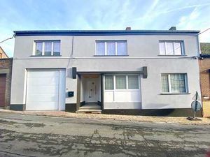 Maison 3 façades avec garage