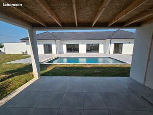 Maison 4 chambres piscine double garage