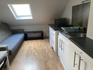 Au coeur du centre ville  appartement sous combles au calme.