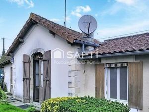 MAISON DE PLAIN-PIED AVEC JARDIN