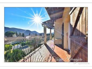 Grande demeure avec jardin et garage