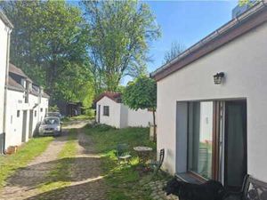 Appartement type maisonette avec jardin commun