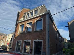 Immeuble mixte avec rez commercial et 2 appartements