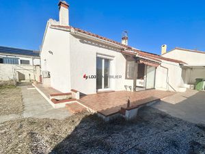 Superbe maison mitoyenne avec jardin  garage et véranda