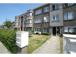 Gerenoveerd tweeslaapkamer appartement met garage