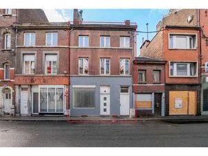 Immeuble de rapport: 1 commerce + 2 appartements