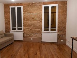 T2 au Coeur de St Cyprien : Murs briques & Parquet