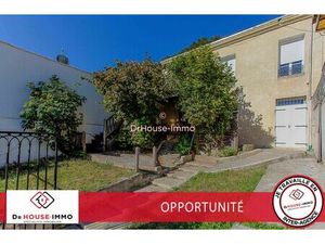 Immeuble en monopropriété  terrasses et jardin.