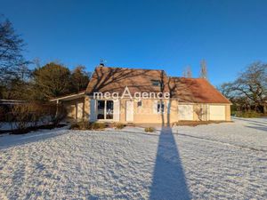 Maison sous la neige