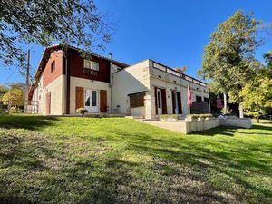 Bel ensemble immobilier alliant confort  tranquillité et nature!