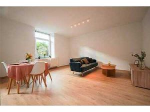 Appartement 1 CH entièrement rénové - petit immeuble