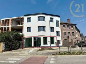 Rez Commercial avec jardin