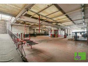Bâtiment industriel de 1.245 M² + jardin 270 M²