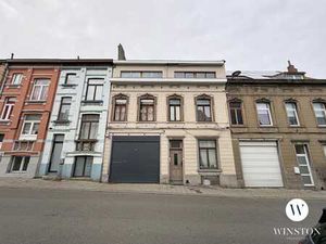 Immeuble mixte avec entrepôt de 350 m² et 4 logements