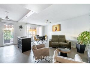 Appartement sur la Place du Promenoir avec garage double et terrasse