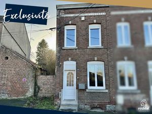 Maison semi-individuelle avec garage