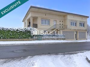 Plain-pied surélevé individuel de 164m² avec garage et jardin!