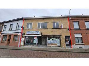 A rénover  commerce + habitation