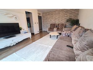 Appartement type 4 avec terrasse et place de parking