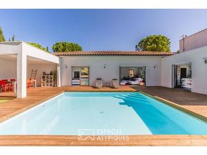 Villa de plain-pied avec piscine avec appartement indépendant et terrain constructible