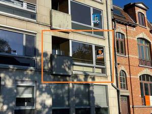 CHARMANT appartement op centrale ligging met GARAGEBOX