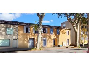 Immeuble de rapport avec 3 appartements et 1 local commercial – Idéal investissement à Qui