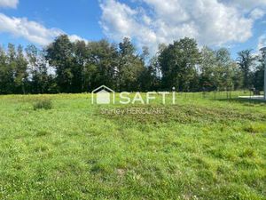 Parcelle viabilisée à Larians et Munans