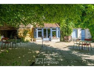 Restaurant troglodyte avec terrasse panoramique sur les vignes
