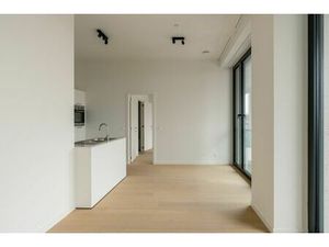 Max Dudler: uitgepuurde lijnen en Zwitserse precisie aan de Scheldekaaien.