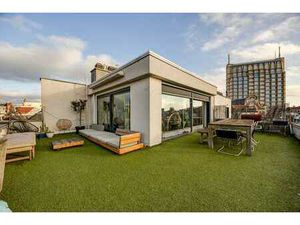 Uniek duplexappartement met zonneterras en garage op topl...