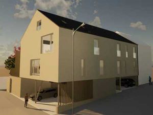 Terrain avec permis pour résidence de 4 appartements