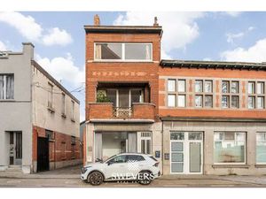 Karaktervolle halfopen bebouwing met 6 slaapkamers en investeringspotentieel nabij centrum