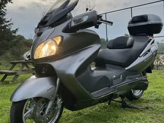 burgman-650-executive-2010-ramada-e-canecas