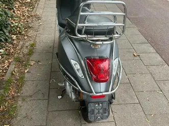 ② sprint en vespa