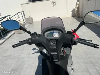 scooter kymco 125 en tres bon état