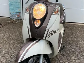 ② sym mio classe b