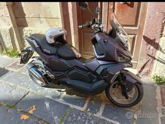 sym adx per vespa
