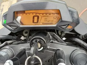 ② kawasaki z 125 cc quasiment neuve .