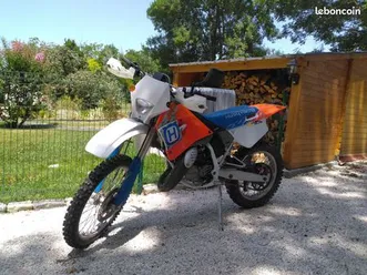 vend ou échange 125 wre husqvarna