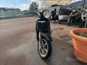 scarabeo 125