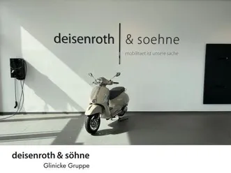 vespa gts 125 beige avvolgente