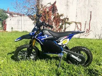dirt bike électrique 1200watts batterie lithium de 48v 15ah roues 14av/12ar